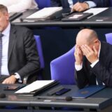 epa11705997 (FILE) - German Chancellor Olaf Scholz (R) reacts after delivering a government declaration, as he sits next to German Finance Minister Christian Lindner (L), in the German parliament 'Bundestag', in Berlin, Germany, 26 June 2024 (reissued 06 November 2024). German Chancellor Scholz announced on 06 November 2024, the dismissal of German Finance Minister Christian Lindner in the course of ongoing consultations between parts of the so-called traffic light coalition of SPD, Greens and FDP.  EPA/CLEMENS BILAN