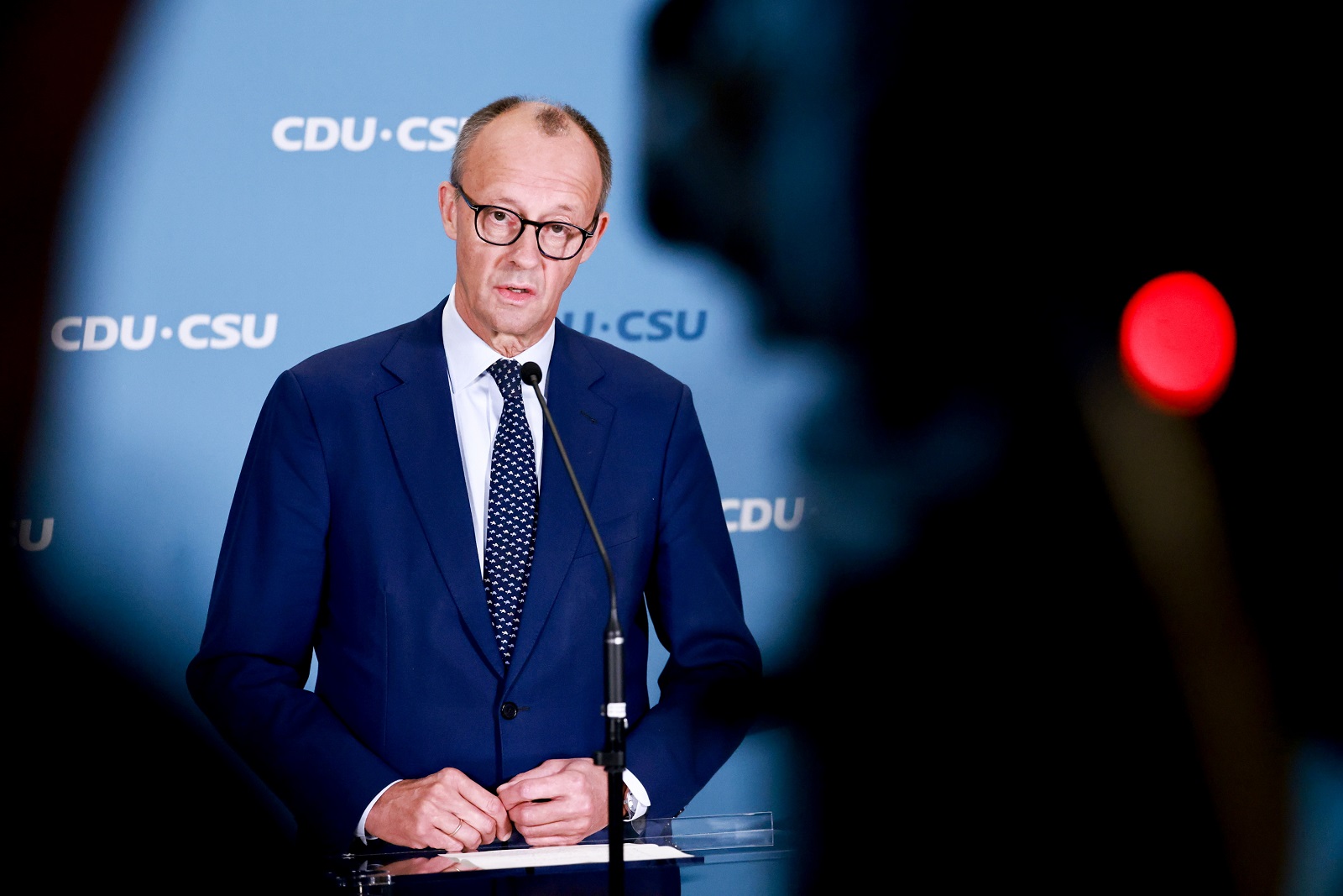 epa11706711 Chairman of the Christian Democratic Union (CDU) party and faction Friedrich Merz gives a statement before a session of the German parliament, in Berlin, Germany, 07 November  2024. German Chancellor Olaf Scholz announced on 06 November, the dismissal of German Finance Minister Christian Lindner in the course of ongoing consultations between parts of the so-called traffic light coalition of the SPD, Greens and FDP.  EPA/HANNIBAL HANSCHKE