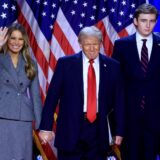 epa11704670 Republican presidential candidate Donald J. Trump, joined by his wife Melania Trump and their son Barron Trump, looks on after addressing supporters at the Election Night watch party in the West Palm Beach Convention Center in West Palm Beach, Florida, USA, 06 November 2024.  EPA/CRISTOBAL HERRERA-ULASHKEVICH