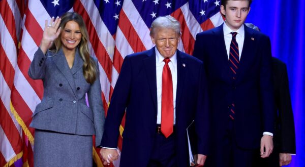 epa11704670 Republican presidential candidate Donald J. Trump, joined by his wife Melania Trump and their son Barron Trump, looks on after addressing supporters at the Election Night watch party in the West Palm Beach Convention Center in West Palm Beach, Florida, USA, 06 November 2024.  EPA/CRISTOBAL HERRERA-ULASHKEVICH