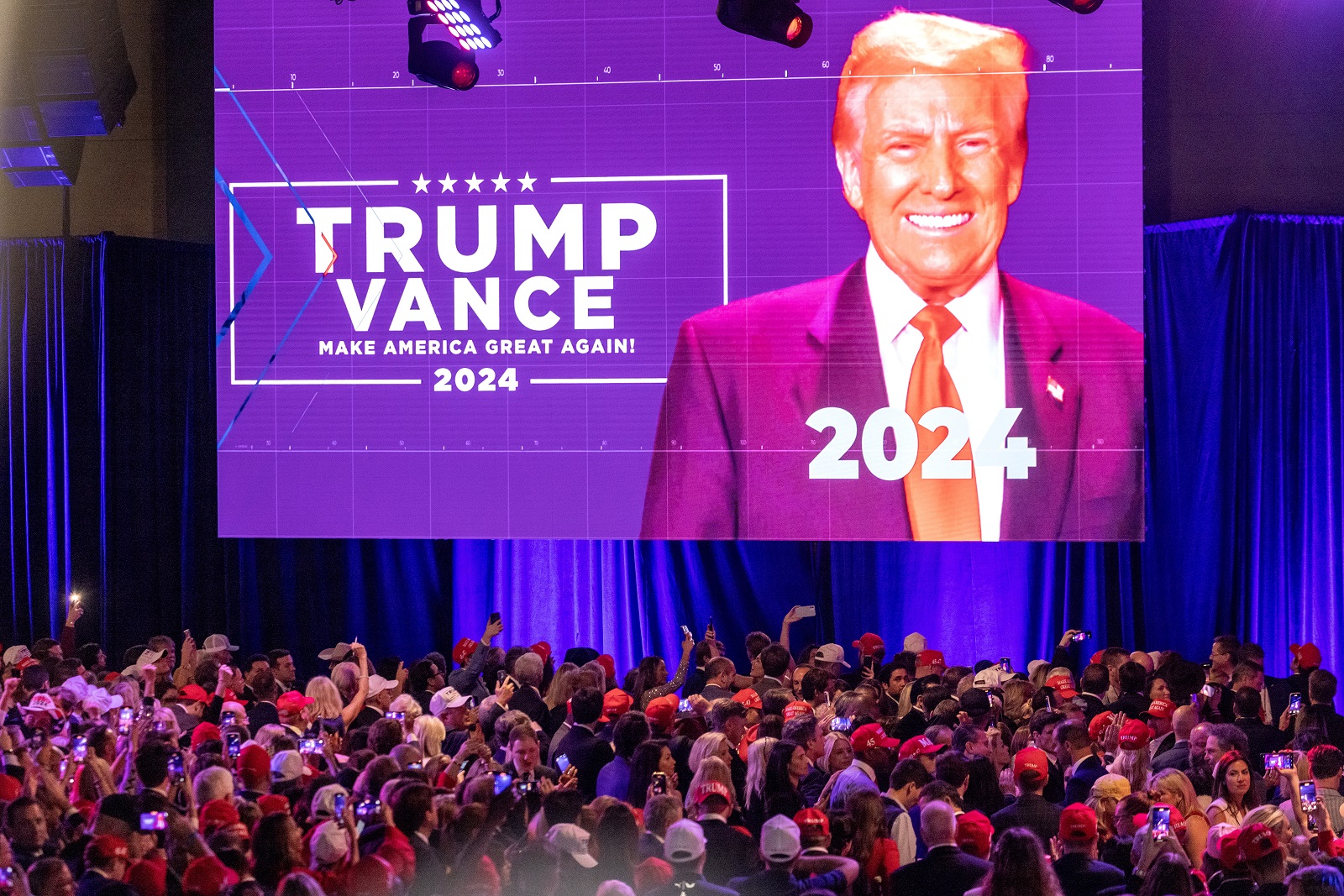 epa11704675 Supporters of Republican presidential candidate Donald Trump react to results of US 2024 presidential elections during the Election Night watch party in the West Palm Beach Convention Center in West Palm Beach, Florida, USA, 06 November 2024.  EPA/CRISTOBAL HERRERA-ULASHKEVICH