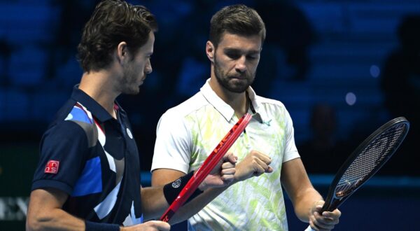 epa11716812 Wesley Koolhof (L) and Nikola Mektic (R) react during their doubles Round Robin match against Marcel Granollers and Horacio Zeballos at the Nitto ATP Finals in Turin, Italy, 12 November 2024.  EPA/MASSIMO RANA