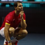 epaselect epa11730095 Rafa Nadal of Spain reacts during a tribute received after the Spanish doubles match against the Netherlands during the Davis Cup quarterfinal between Netherlands and Spain at the Jose Maria Martin Carpena Sports Palace in Malaga, Spain, 19 November 2024.  EPA/JORGE ZAPATA