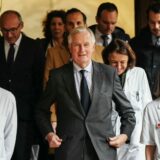 epa11740111 French Prime Minister Michel Barnier (C) walks with medical staff as he visits the 'House of Women of the AP-HP' ('Maison des Femmes de l'Assistance Publique - Hopitaux de Paris'), as part of events commemorating the International Day for the Elimination of Violence Against Women, in Paris, France, 25 November 2024. The International Day for the Elimination of Violence Against Women is marked annually on 25 November, with this year's theme being 'Every 10 Minutes, a woman is killed. #NoExcuse. UNiTE to End Violence against Women'.  EPA/DIMITAR DILKOFF / POOL  MAXPPP OUT