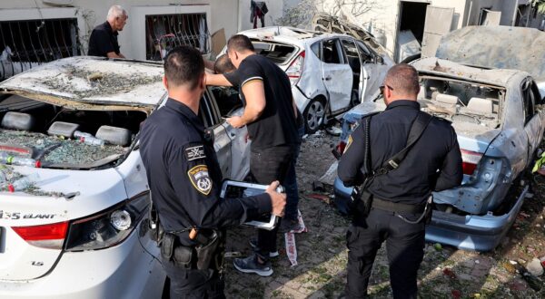 Israeli police officers and residents check the damage following a rocket attack from southern Lebanon that targeted the central Israeli-Arab city of Tira, on November 2, 2024, amid the ongoing war between Israel and Hezbollah.,Image: 929356702, License: Rights-managed, Restrictions: , Model Release: no, Credit line: JACK GUEZ / AFP / Profimedia