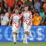 14.06.2023., stadion Feyenoord "De Kuip", Rotterdam, Nizozemska - UEFA Liga Nacija, polufinale, Nizozemska - Hrvatska. Nogometasi Hrvatske slave pogodak za vodstvo 4:2. Luka Modric, Ivan Perisic Photo: Luka Stanzl/PIXSELL