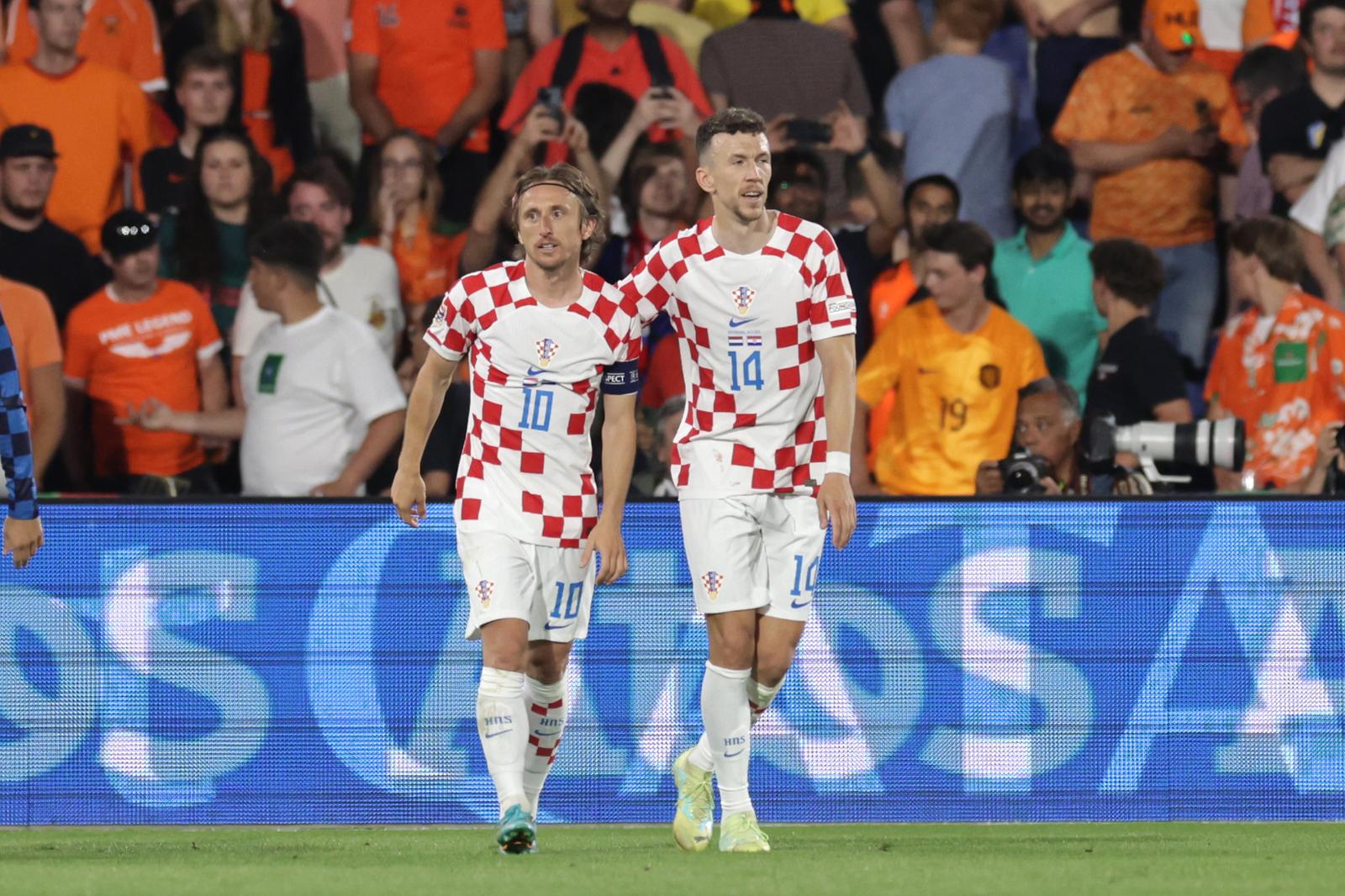 14.06.2023., stadion Feyenoord "De Kuip", Rotterdam, Nizozemska - UEFA Liga Nacija, polufinale, Nizozemska - Hrvatska. Nogometasi Hrvatske slave pogodak za vodstvo 4:2. Luka Modric, Ivan Perisic Photo: Luka Stanzl/PIXSELL