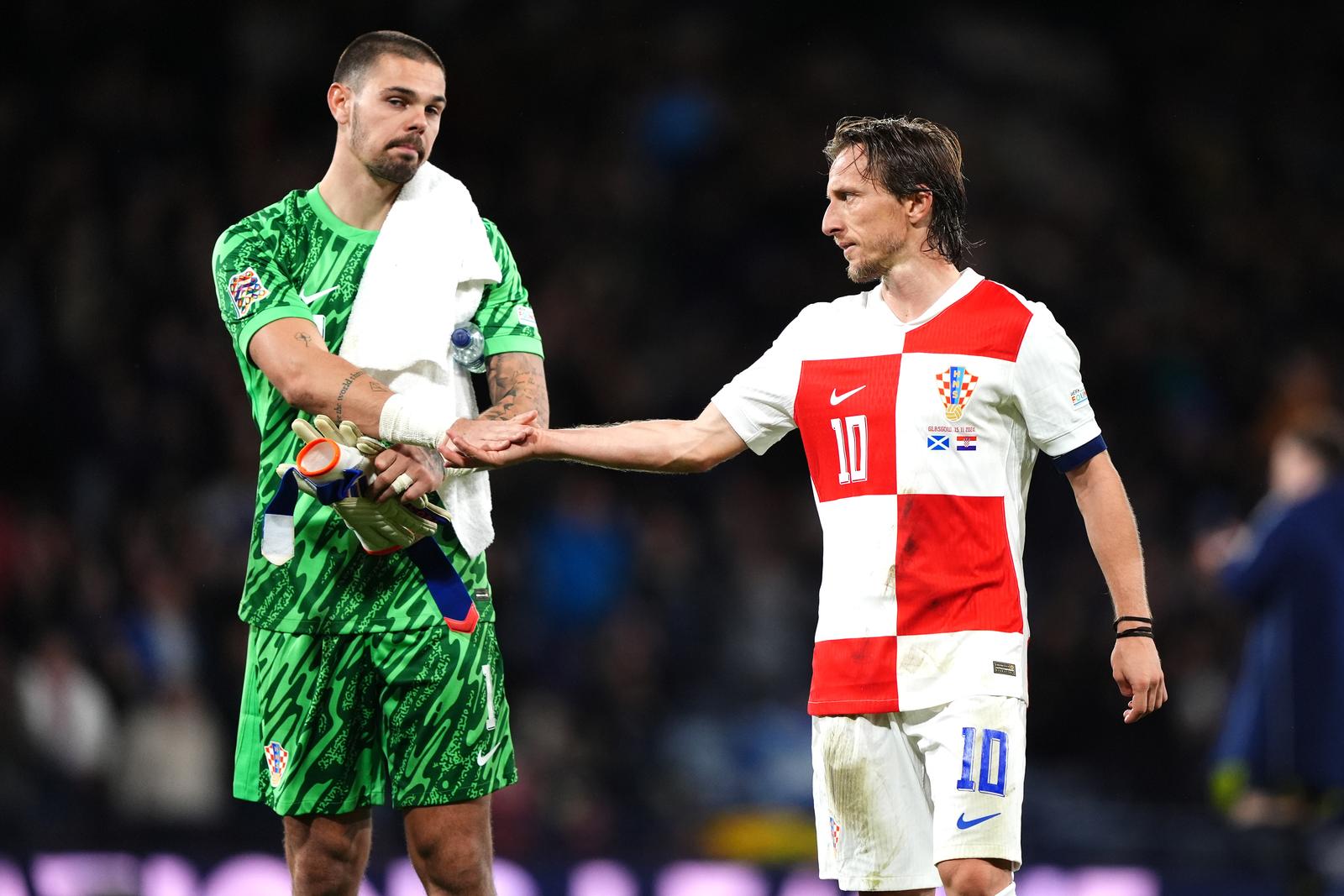 15.11.2024., Glasgow, Skotska - Susret Hrvatske i Skotske u 5. kolu Lige nacija, skupina A na Hampden Parku. Dominik Kotarski, Luka Modric Photo: Andrew Milligan/Pa Wire/PIXSELL