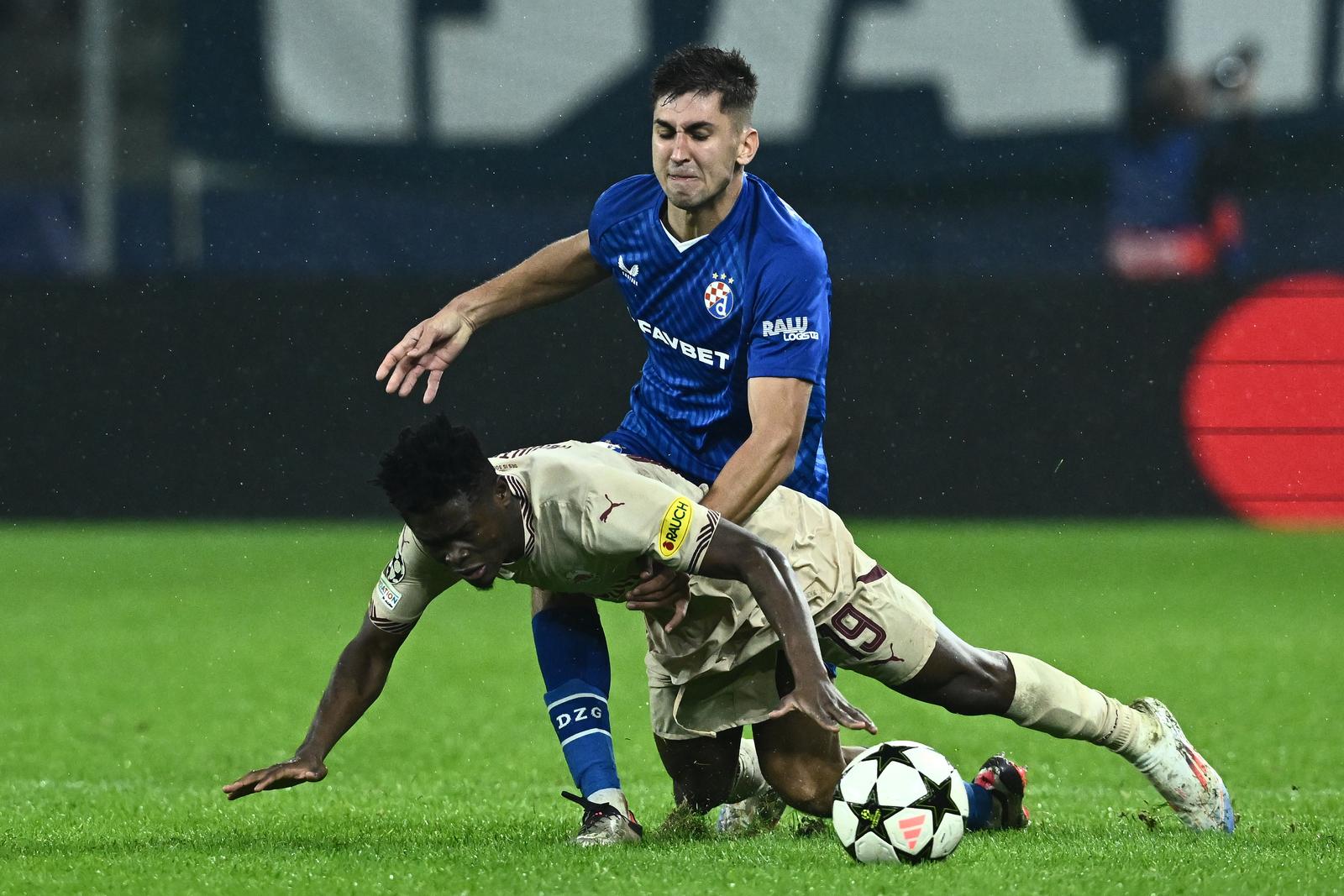 23.10.2024., stadion Salzburg, Salzburg, Austrija - UEFA Liga prvaka, grupna faza, 3. kolo, FC Salzburg - GNK Dinamo. Karim Konate, Raul Torrente Photo: Marko Lukunic/PIXSELL