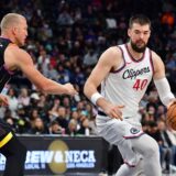 Oct 31, 2024; Inglewood, California, USA; Los Angeles Clippers center Ivica Zubac (40) moves the ball against Phoenix Suns center Mason Plumlee (22) during the second half at Intuit Dome. Mandatory Credit: Gary A. Vasquez-Imagn Images Photo: Gary A. Vasquez/REUTERS