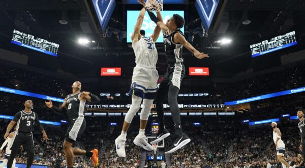 Nov 2, 2024; San Antonio, Texas, USA; San Antonio Spurs center Victor Wembanyama (1) blocks the shot attempted by Minnesota Timberwolves center Rudy Gobert (27) during the first half at Frost Bank Center. Mandatory Credit: Scott Wachter-Imagn Images Photo: Scott Wachter/REUTERS