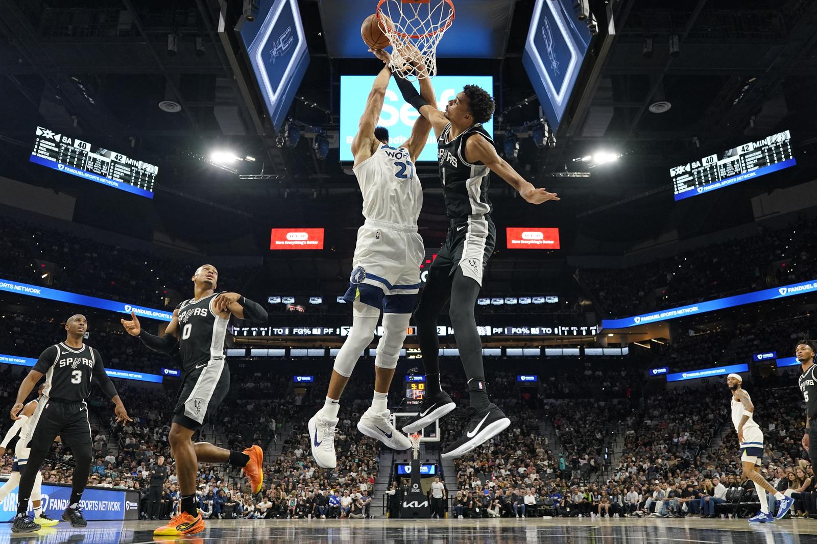 Nov 2, 2024; San Antonio, Texas, USA; San Antonio Spurs center Victor Wembanyama (1) blocks the shot attempted by Minnesota Timberwolves center Rudy Gobert (27) during the first half at Frost Bank Center. Mandatory Credit: Scott Wachter-Imagn Images Photo: Scott Wachter/REUTERS