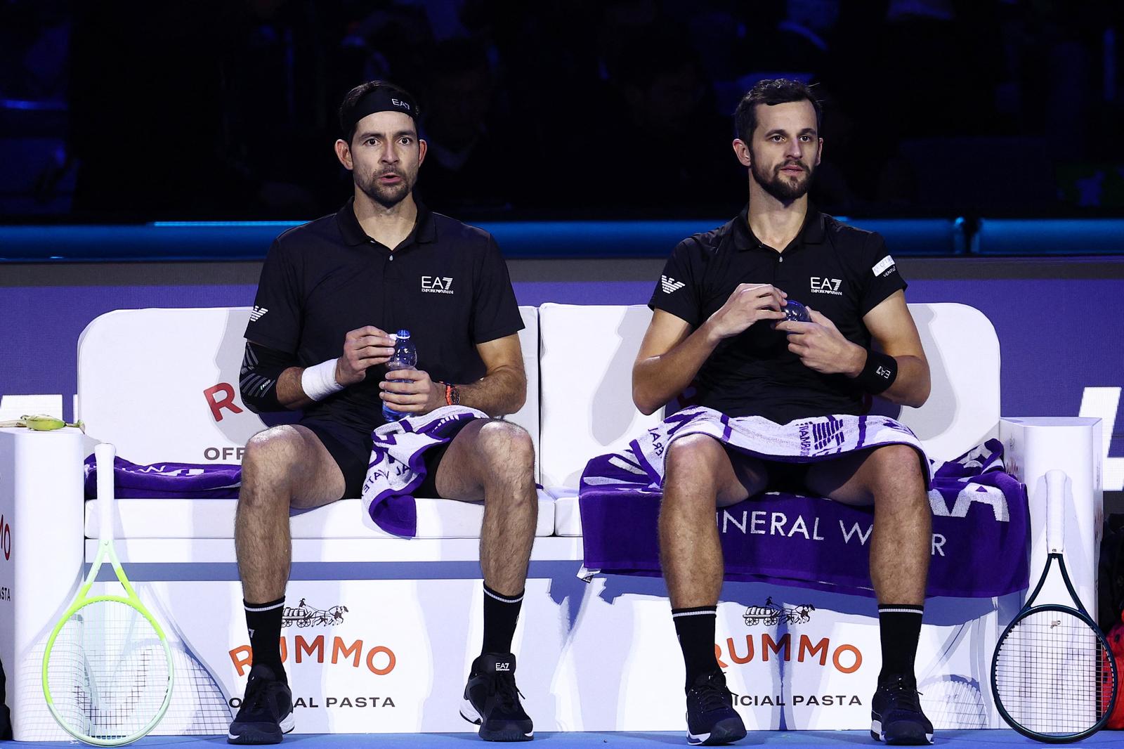 Tennis - ATP Finals - Inalpi Arena, Turin, Italy - November 17, 2024 El Salvador's Marcelo Arevalo and Croatia's Mate Pavic during a break in play on their doubles final against against Germany's Kevin Krawietz and Tim Puetz REUTERS/Guglielmo Mangiapane Photo: GUGLIELMO MANGIAPANE/REUTERS