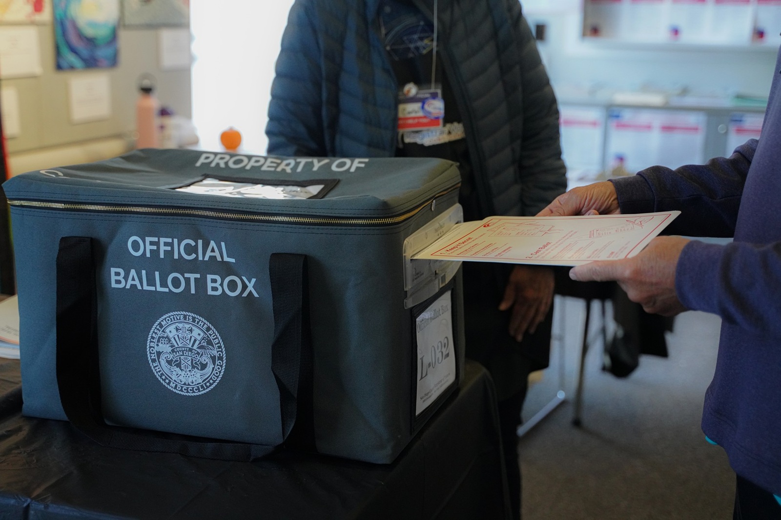 A voter puts his ballot into the official ballot box at one of the early voting centers in San Diego. The United States presidential election will take place on Tuesday, November 5th, featuring candidates Trump and Harris. In California, early voting started on October 26th and will continue until November 5th, with voters able to cast their votes at designated voting centers. All vote centers will close at 8 PM on election day.,Image: 928865185, License: Rights-managed, Restrictions: *** World Rights ***, Model Release: no, Credit line: SOPA Images / ddp USA / Profimedia