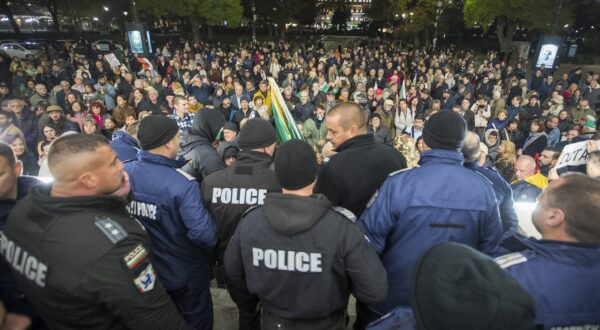 Police officers guard the entrance of the Bulgarian National theater Ivan Vazov prior to the premiere of 