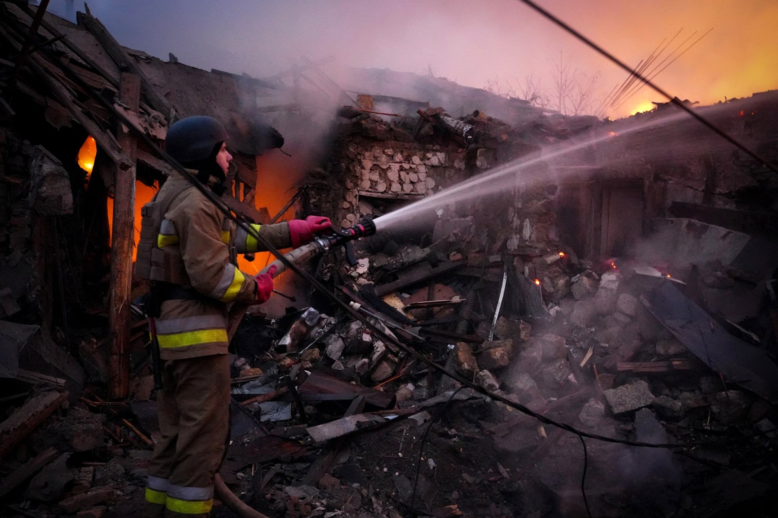 In this handout photograph taken and released by the Ukrainian Emergency Service on November 17, 2024, a Ukrainian rescuer works to extinguish a fire in a building following a drone attack in Mykolaiv. Ukraine's energy operator DTEK on November 17, 2024 announced "emergency power cuts" in the Kyiv region and two others in the east after authorities revealed Russia had launched a "massive" aerial attack on the energy grid.,Image: 935408038, License: Rights-managed, Restrictions: RESTRICTED TO EDITORIAL USE - MANDATORY CREDIT "AFP PHOTO / UKRAINIAN EMERGENCY SERVICE" - NO MARKETING NO ADVERTISING CAMPAIGNS - DISTRIBUTED AS A SERVICE TO CLIENTS, ***
HANDOUT image or SOCIAL MEDIA IMAGE or FILMSTILL for EDITORIAL USE ONLY! * Please note: Fees charged by Profimedia are for the Profimedia's services only, and do not, nor are they intended to, convey to the user any ownership of Copyright or License in the material. Profimedia does not claim any ownership including but not limited to Copyright or License in the attached material. By publishing this material you (the user) expressly agree to indemnify and to hold Profimedia and its directors, shareholders and employees harmless from any loss, claims, damages, demands, expenses (including legal fees), or any causes of action or allegation against Profimedia arising out of or connected in any way with publication of the material. Profimedia does not claim any copyright or license in the attached materials. Any downloading fees charged by Profimedia are for Profimedia's services only. * Handling Fee Only 
***, Model Release: no, Credit line: Handout / AFP / Profimedia