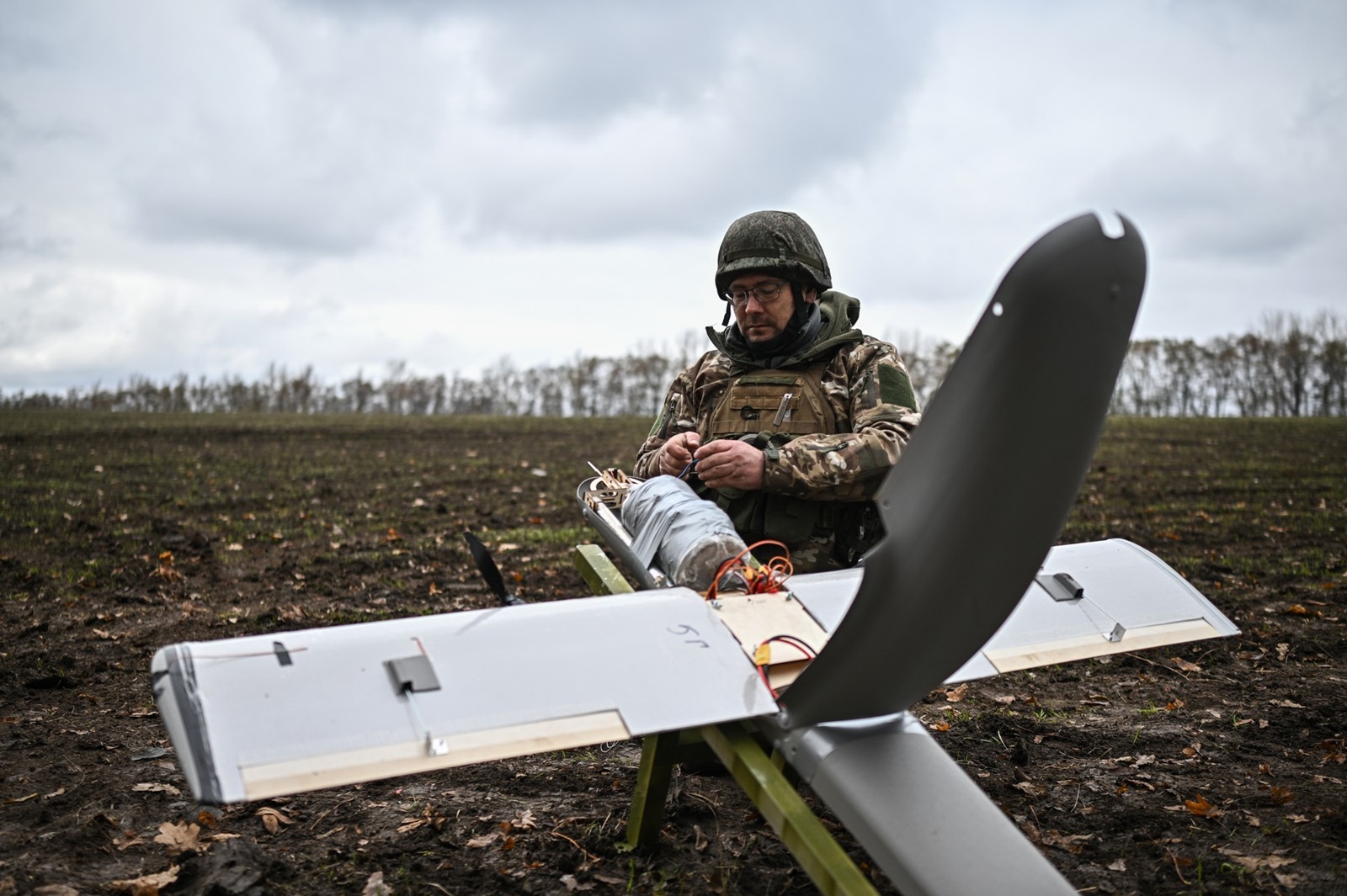 8803393 11.11.2024 A Russian serviceman of the Phoenix special mine-laying battalion prepares to launch a Molniya 2 unmanned aerial vehicle (UAV) in the course of Russia's military operation in Ukraine, in Kursk region, Russia.,Image: 933379820, License: Rights-managed, Restrictions: Editors' note: THIS IMAGE IS PROVIDED BY RUSSIAN STATE-OWNED AGENCY SPUTNIK., Model Release: no, Credit line: Sergey Bobylev / Sputnik / Profimedia