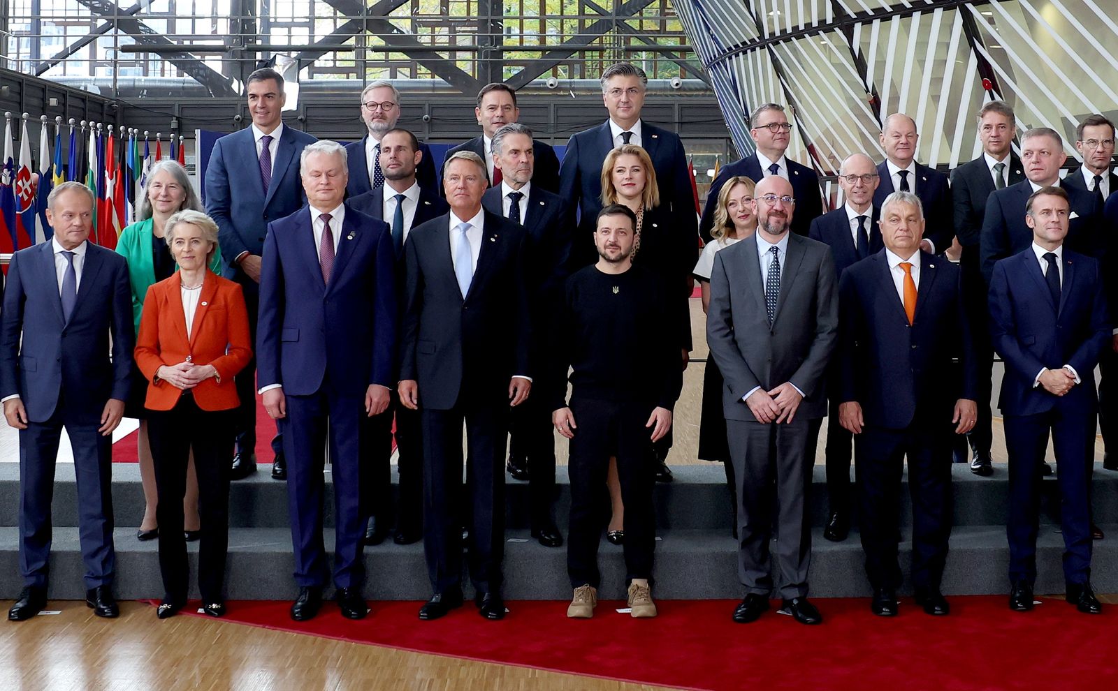 epa11663936 President of Ukraine Volodymyr Zelenskyy (front row C) and European leaders pose for a family photo before the European Council summit in Brussels, Belgium, 17 October 2024. EU leaders are meeting in Brussels to discuss Ukraine, the Middle East, competitiveness, migration and foreign affairs.  EPA/CHRISTOPHER NEUNDORF