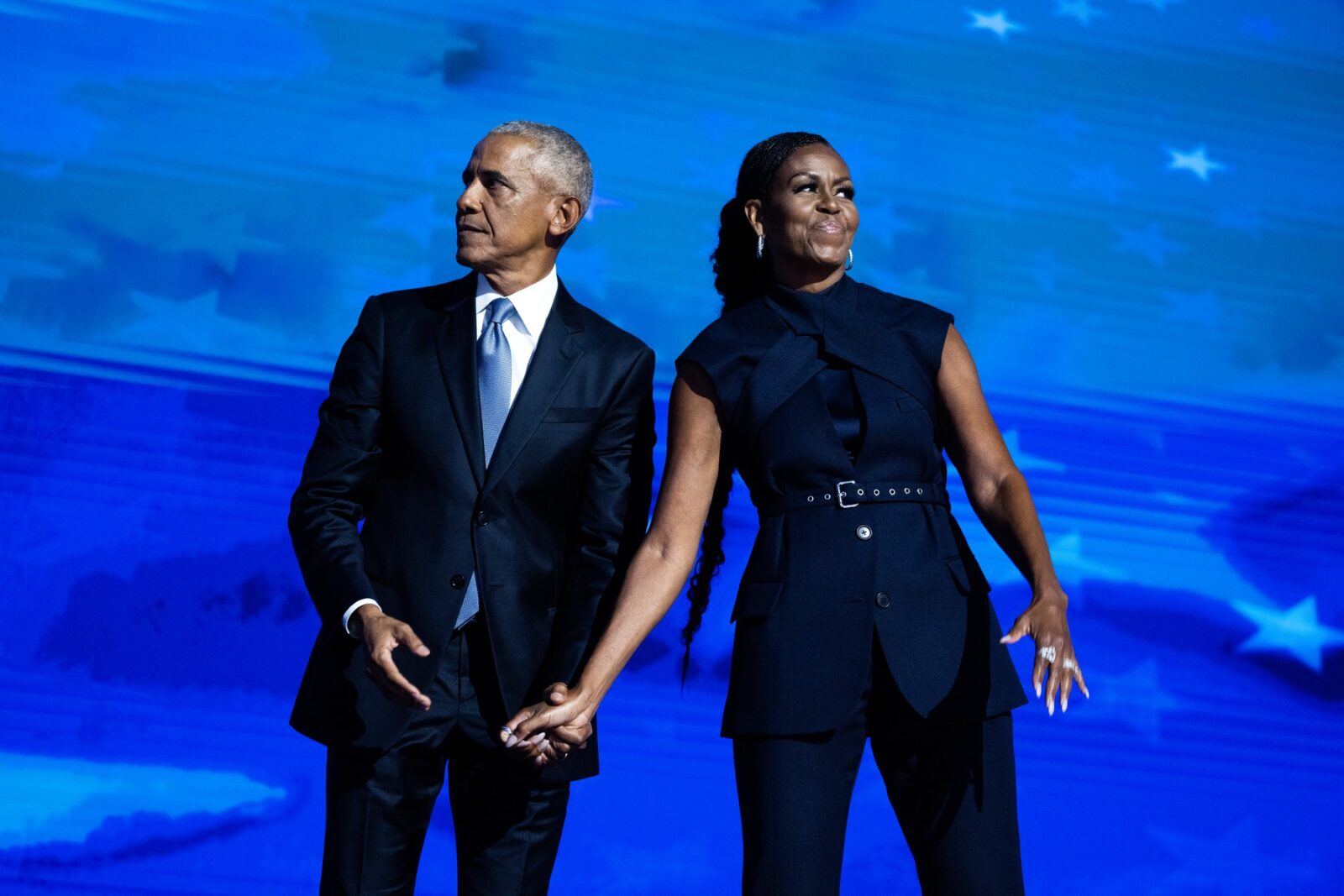 UNITED STATES - AUGUST 20: Former President Barack Obama and former first lady Michelle Obama appear on stage on the second night of the Democratic National Convention at the United Center in Chicago, Ill., on Tuesday, August 20, 2024. (Tom Williams/CQ Roll Call/Sipa USA),Image: 902360463, License: Rights-managed, Restrictions: *** World Rights *** Minimum Rates Apply in the US: $75 for Print, $20 for Web ***, Model Release: no, Credit line: CQ-Roll Call / ddp USA / Profimedia