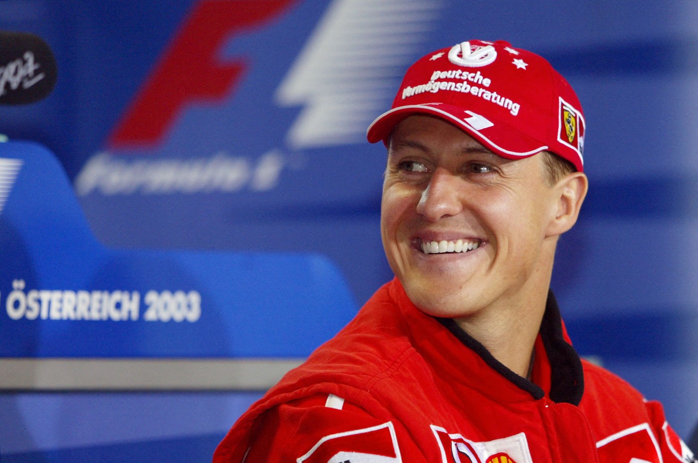 German Ferrari driver Michael Schumacher smiles during a press point in the media center of the Spielberg racetrack, 15 May 2003 three days before the Austrian Formula One Grand Prix.    AFP PHOTO PATRICK HERTZOG,Image: 69696528, License: Rights-managed, Restrictions: DV2, Model Release: no, Credit line: Patrick HERTZOG / AFP / Profimedia