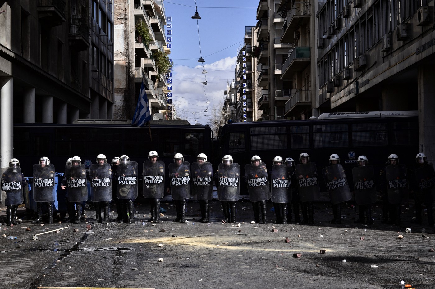 Police stand by a blockade during a Greek farmer's protest against higher taxes outside the Agriculture ministry in Athens, on March 8, 2017.  Two people were detained after the windows of two police vans were smashed as approximately 1,000 farmers, mainly from the island of Crete, took part in the protest.,Image: 324444075, License: Rights-managed, Restrictions: , Model Release: no, Credit line: LOUISA GOULIAMAKI / AFP / Profimedia