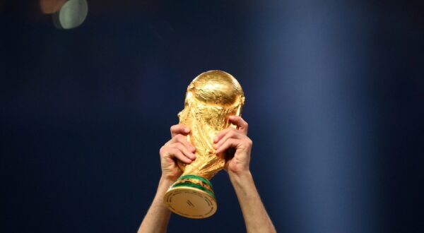 A player of Argentina lifts the World Cup trophy during the Qatar 2022 World Cup trophy ceremony after the football final match between Argentina and France at Lusail Stadium in Lusail, north of Doha on December 18, 2022. Argentina won in the penalty shoot-out.,Image: 745402290, License: Rights-managed, Restrictions: , Model Release: no, Credit line: FRANCK FIFE / AFP / Profimedia