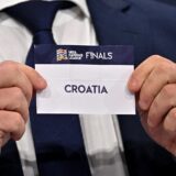 Dutch retired football player Wesley Sneijder shows the paper slip of Croatia during the 2023 UEFA Nations League football finals draw in Nyon, Switzerland, on January 25, 2023. The draw determines the semi-final pairings for the four-team 2023 UEFA Nations League football finals in Rotterdam and Enschede, as semi-finals will be played on June 14 and June 15, 2023, with the third-place play-off and final both on June 18, 2023.,Image: 751648672, License: Rights-managed, Restrictions: , Model Release: no, Credit line: Fabrice COFFRINI / AFP / Profimedia