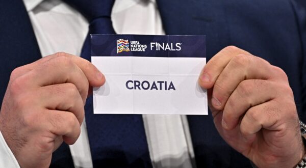 Dutch retired football player Wesley Sneijder shows the paper slip of Croatia during the 2023 UEFA Nations League football finals draw in Nyon, Switzerland, on January 25, 2023. The draw determines the semi-final pairings for the four-team 2023 UEFA Nations League football finals in Rotterdam and Enschede, as semi-finals will be played on June 14 and June 15, 2023, with the third-place play-off and final both on June 18, 2023.,Image: 751648672, License: Rights-managed, Restrictions: , Model Release: no, Credit line: Fabrice COFFRINI / AFP / Profimedia