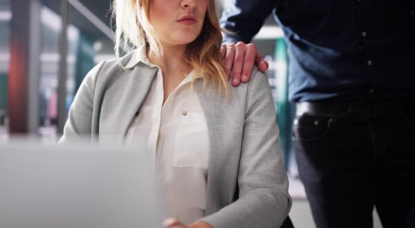 Sexual Harassment At Workplace Inappropriate Touching On Shoulder,Image: 851592287, License: Royalty-free, Restrictions: , Model Release: yes, Credit line: Andriy Popov / Panthermedia / Profimedia