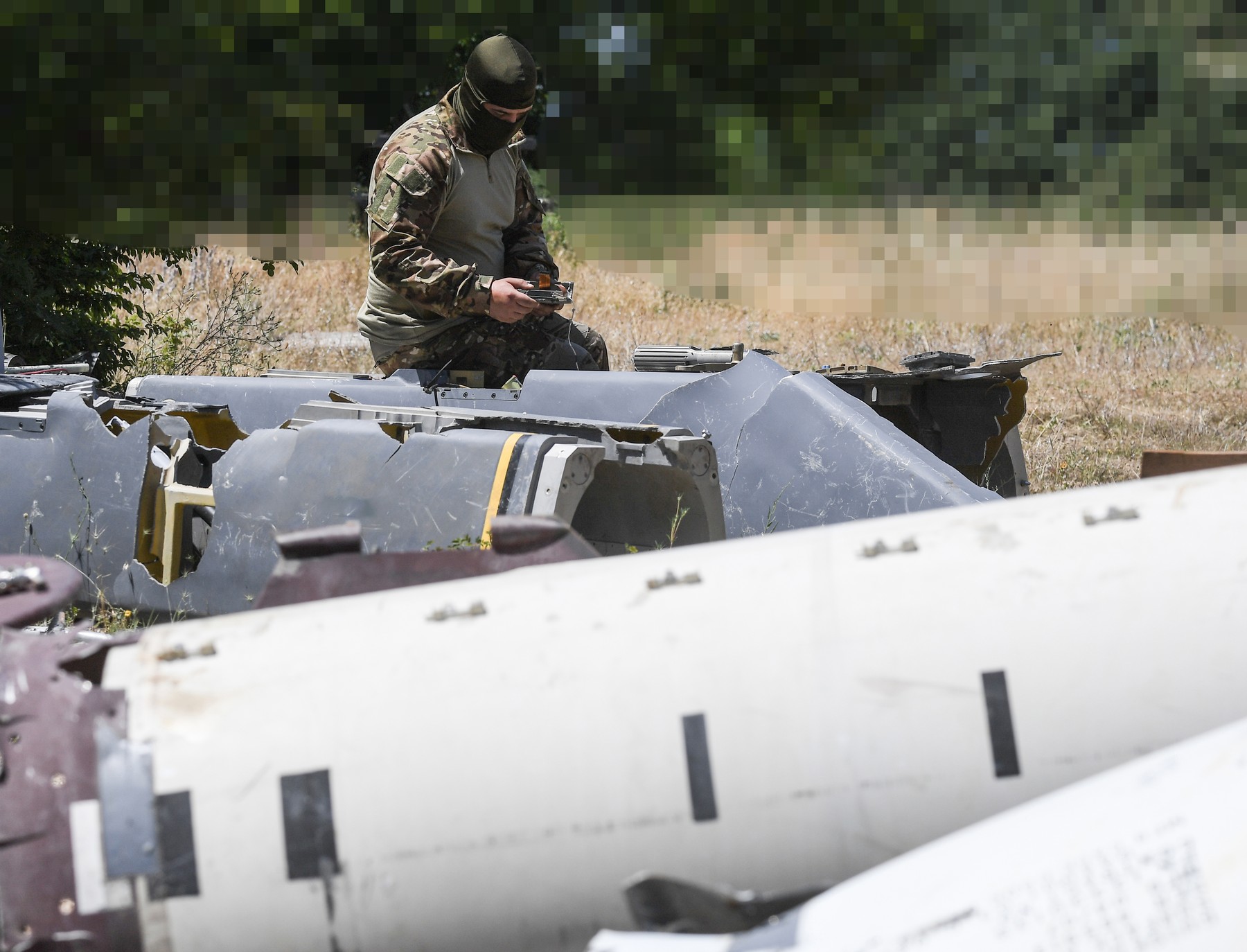 8722673 10.06.2024 A Russian specialist inspects fragments of a Franco-British-made long-range air-launched cruise missile Storm Shadow used by Ukraine amid Russia's military operation, at an unknown location.,Image: 887370659, License: Rights-managed, Restrictions: Editors' note: THIS IMAGE IS PROVIDED BY RUSSIAN STATE-OWNED AGENCY SPUTNIK., Model Release: no, Credit line: RIA Novosti / Sputnik / Profimedia