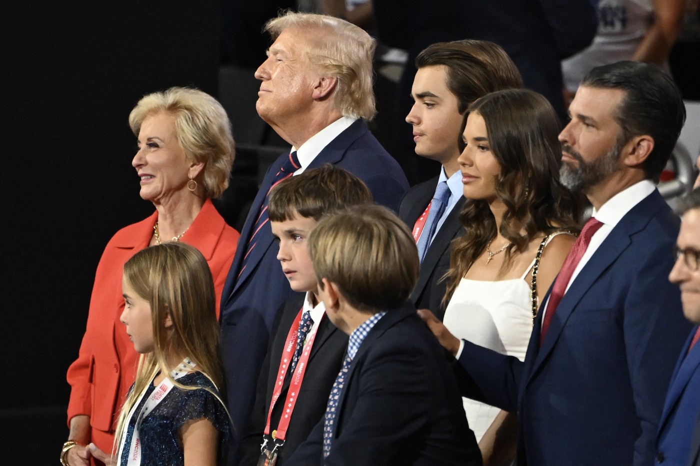 Former US President and 2024 Republican presidential candidate Donald Trump stands with his grandchildren, son Donald Trump Jr. (R) and former Administrator of the Small Business Administration Linda McMahon (L) on the third day of the 2024 Republican National Convention at the Fiserv Forum in Milwaukee, Wisconsin, on July 17, 2024. Days after he survived an assassination attempt Donald Trump won formal nomination as the Republican presidential candidate and picked Ohio US Senator J.D. Vance for running mate.,Image: 890492476, License: Rights-managed, Restrictions: , Model Release: no, Credit line: ANDREW CABALLERO-REYNOLDS / AFP / Profimedia