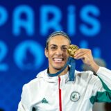 PARIS, FRANCE - AUGUST 09: Imane Khelif of Team Algeria celebrates as she wins gold medal after defeating Liu Yang (blue) of China in the Boxing Women's 66kg Final match on day fourteen of the Olympic Games Paris 2024 at Roland Garros on August 09, 2024 in Paris, France. Aytac Unal / Anadolu/ABACAPRESS.COM,Image: 897490223, License: Rights-managed, Restrictions: , Model Release: no, Credit line: AA/ABACA / Abaca Press / Profimedia