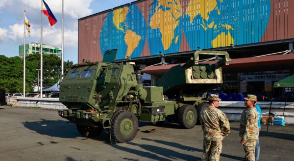 PASAY, METRO MANILA, PHILIPPINES - SEPTEMBER 25: Two American soldiers are seen in front of a M142 High Mobility Artillery Rocket System (HIMARS) vehicle parked outside the World Trade Center during the 2024 Asian Defense and Security Exhibition (ADAS), in Pasay City, Metro Manila, the Philippines, on 25 September, 2024. The ADAS exhibition features weapons, military equipment and vehicles from companies from various countries including Turkiye, United States, Germany, France; India, South Korea and China, with two days of symposiums to discuss issues on South China Sea or West Philippines Sea tensions, and how QUAD member states such as Japan, United States and Australia as well as European countries can collaborate in the Asia Pacific region. Daniel Ceng / Anadolu/ABACAPRESS.COM,Image: 911700598, License: Rights-managed, Restrictions: , Model Release: no, Credit line: AA/ABACA / Abaca Press / Profimedia