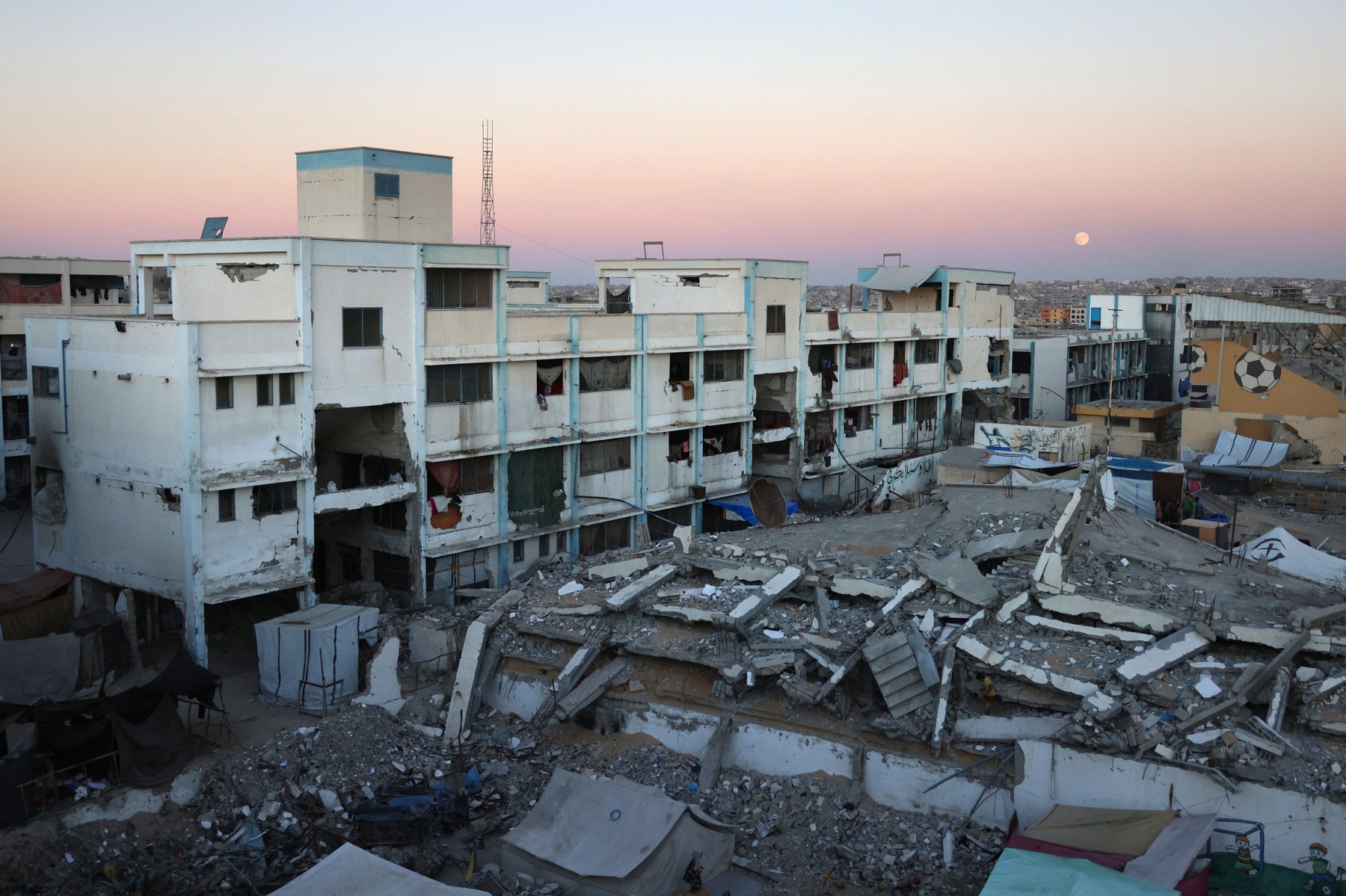 This picture shows on September 17, 2024 a school partially destroyed by Israeli strikes in Khan Yunis in the southern Gaza Strip, amid the ongoing war between Israel and the Hamas militant group. Hamas's attack on October 7 resulted in the deaths of 1,205 people on the Israeli side, most of them civilians, according to an AFP tally based on Israeli official figures. Israel's retaliatory military campaign in Gaza has killed at least 41,431 Palestinians, the majority of them civilians, according to figures provided by the health ministry in Hamas-run Gaza. The United Nations has acknowledged the toll as reliable.,Image: 912596816, License: Rights-managed, Restrictions: , Model Release: no, Credit line: Bashar TALEB / AFP / Profimedia