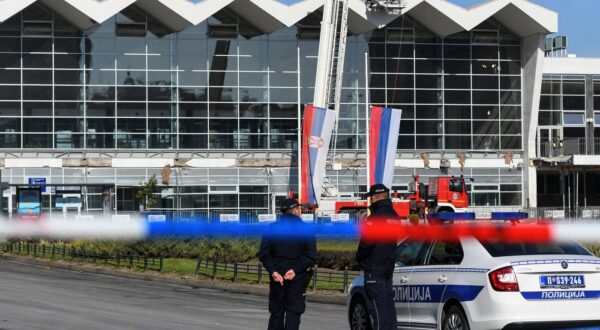 Policemen stand guard outside a train station in the northern Serbian city of Novi Sad on November 2, 2024, the day after an outdoor roof collapsed leaving at least 14 people killed and several people injured, according to emergency services in the area. Mourners lit candles and laid flowers in northern Serbia on November 2, 2024 as authorities launched a probe after 14 people were killed in a train station roof collapse. The incident happened early on November 1, 2024 at the main train station in the northern city of Novi Sad.,Image: 929498560, License: Rights-managed, Restrictions: , Model Release: no, Credit line: Nenad Mihajlovic / AFP / Profimedia