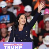 Former US Representative Tulsi Gabbard waves as she arrives to speak during a campaign rally for former US President and Republican presidential candidate Donald Trump at PPG Paints Arena in Pittsburgh, Pennsylvania, on November 4, 2024.,Image: 930500564, License: Rights-managed, Restrictions: , Model Release: no, Credit line: CHARLY TRIBALLEAU / AFP / Profimedia