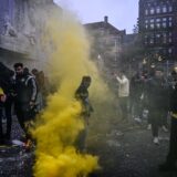 AMSTERDAM, NETHERLANDS - NOVEMBER 7: Fans of Maccabi Tel Aviv stage a pro-Israel demonstration at the Dam Square, lighting up flares and chanting slogans ahead of the UEFA Europa League match between Maccabi Tel Aviv and Ajax in Amsterdam, Netherlands on November 07, 2024. Maccabi fans clashed with pro-Palestinian citizens and ripped off Palestinian flags hung on the streets. In the lead-up to the Ajax vs Maccabi Tel Aviv match, several areas of Amsterdam have been designated as security risk zones. Mouneb Taim / Anadolu,Image: 931826131, License: Rights-managed, Restrictions: , Model Release: no, Credit line: Mouneb Taim / AFP / Profimedia