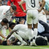 Teammates check on Real Madrid's Brazilian defender #03 Eder Militao (BOTTOM) after resulting injured during the Spanish league football match between Real Madrid CF and CA Osasuna at the Santiago Bernabeu stadium in Madrid on November 9, 2024.,Image: 932326710, License: Rights-managed, Restrictions: ALTERNATIVE CROP, Model Release: no, Credit line: OSCAR DEL POZO / AFP / Profimedia