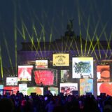 The Brandenburg gate is illuminated during celebrations marking the 35th anniversary of the fall of the Berlin Wall in Berlin on November 9, 2024. Germany on Saturday celebrates 35 years since the fall of the Berlin Wall ushered in the end of communism and national reunification.,Image: 932336983, License: Rights-managed, Restrictions: , Model Release: no, Credit line: RALF HIRSCHBERGER / AFP / Profimedia