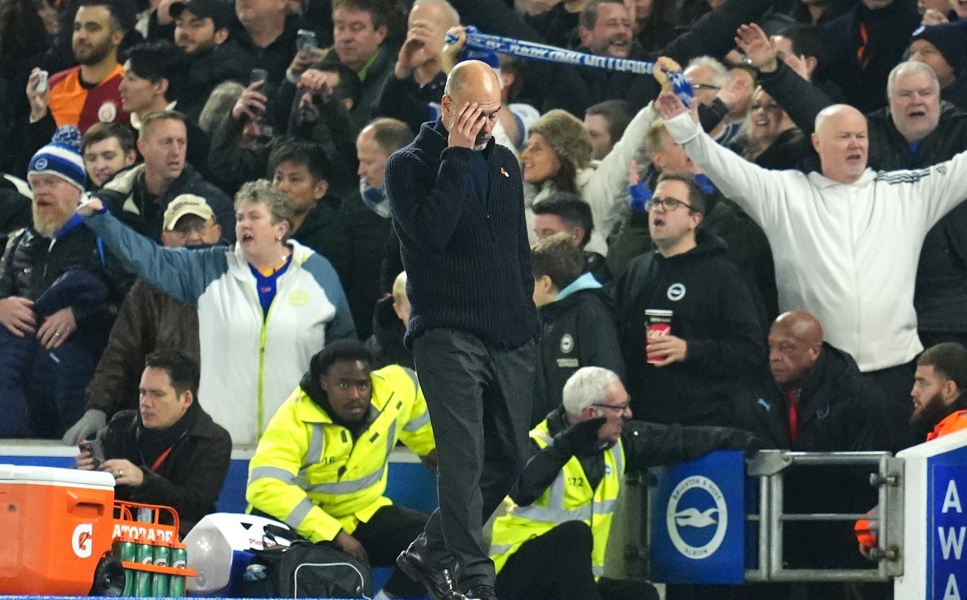 Manchester City manager Pep Guardiola reacts during the Premier League match at American Express Stadium, Brighton. Picture date: Saturday November 9, 2024.,Image: 932393193, License: Rights-managed, Restrictions: EDITORIAL USE ONLY No use with unauthorised audio, video, data, fixture lists, club/league logos or "live" services. Online in-match use limited to 120 images, no video emulation. No use in betting, games or single club/league/player publications., Model Release: no, Credit line: Adam Davy / PA Images / Profimedia