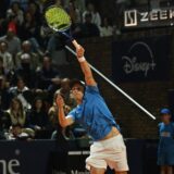 Uruguay's Diego Forlan serves the ball next to Argentina's Federico Coria (out of frame) as they play against Bolivia's Boris Arias and Fernando Zeballos during their men's doubles match of the Uruguay Open Challenger ATP tournament at the Carrasco Lawn Tennis Club in Montevideo on November 13, 2024.,Image: 934159561, License: Rights-managed, Restrictions: , Model Release: no, Credit line: Eitan ABRAMOVICH / AFP / Profimedia