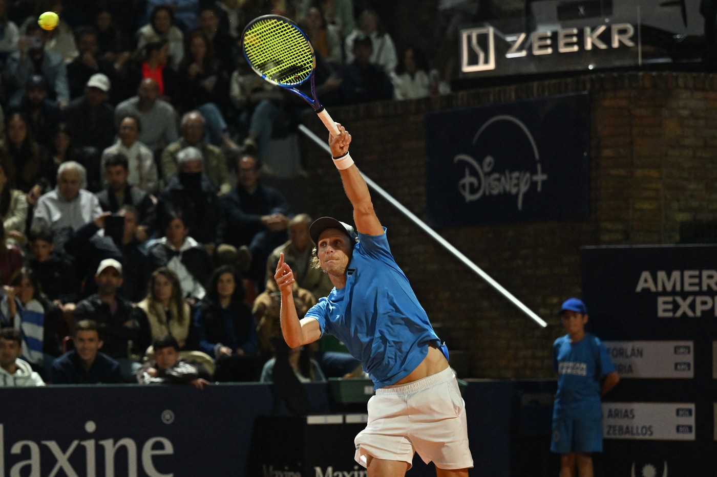 Uruguay's Diego Forlan serves the ball next to Argentina's Federico Coria (out of frame) as they play against Bolivia's Boris Arias and Fernando Zeballos during their men's doubles match of the Uruguay Open Challenger ATP tournament at the Carrasco Lawn Tennis Club in Montevideo on November 13, 2024.,Image: 934159561, License: Rights-managed, Restrictions: , Model Release: no, Credit line: Eitan ABRAMOVICH / AFP / Profimedia