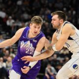 SALT LAKE CITY, UTAH - NOVEMBER 14: Kyle Filipowski #22 of the Utah Jazz drives into Luka Doncic #77 of the Dallas Mavericks during the second half of a game at Delta Center on November 14, 2024 in Salt Lake City, Utah.,Image: 934642171, License: Rights-managed, Restrictions: , Model Release: no, Credit line: Alex Goodlett / Getty images / Profimedia