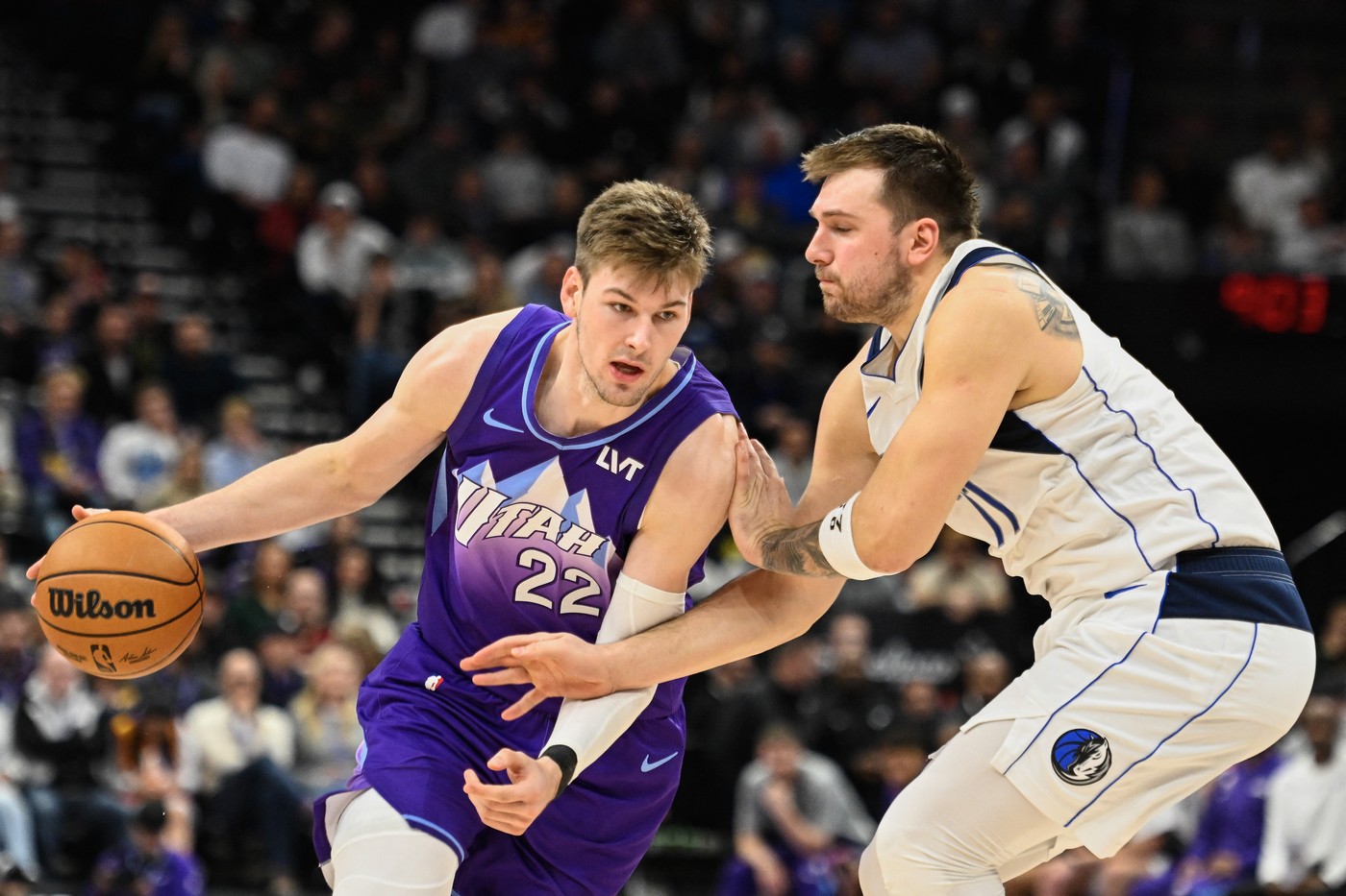 SALT LAKE CITY, UTAH - NOVEMBER 14: Kyle Filipowski #22 of the Utah Jazz drives into Luka Doncic #77 of the Dallas Mavericks during the second half of a game at Delta Center on November 14, 2024 in Salt Lake City, Utah.,Image: 934642171, License: Rights-managed, Restrictions: , Model Release: no, Credit line: Alex Goodlett / Getty images / Profimedia