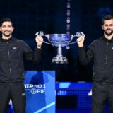 Salvador's Marcelo Arevalo (L) and teammate Croatia's Mate Pavic pose with the ATP year-end No.1 ranked doubles players trophy during the ATP Finals tennis tournament in Turin on November 15, 2024.,Image: 934759954, License: Rights-managed, Restrictions: , Model Release: no, Credit line: Marco BERTORELLO / AFP / Profimedia