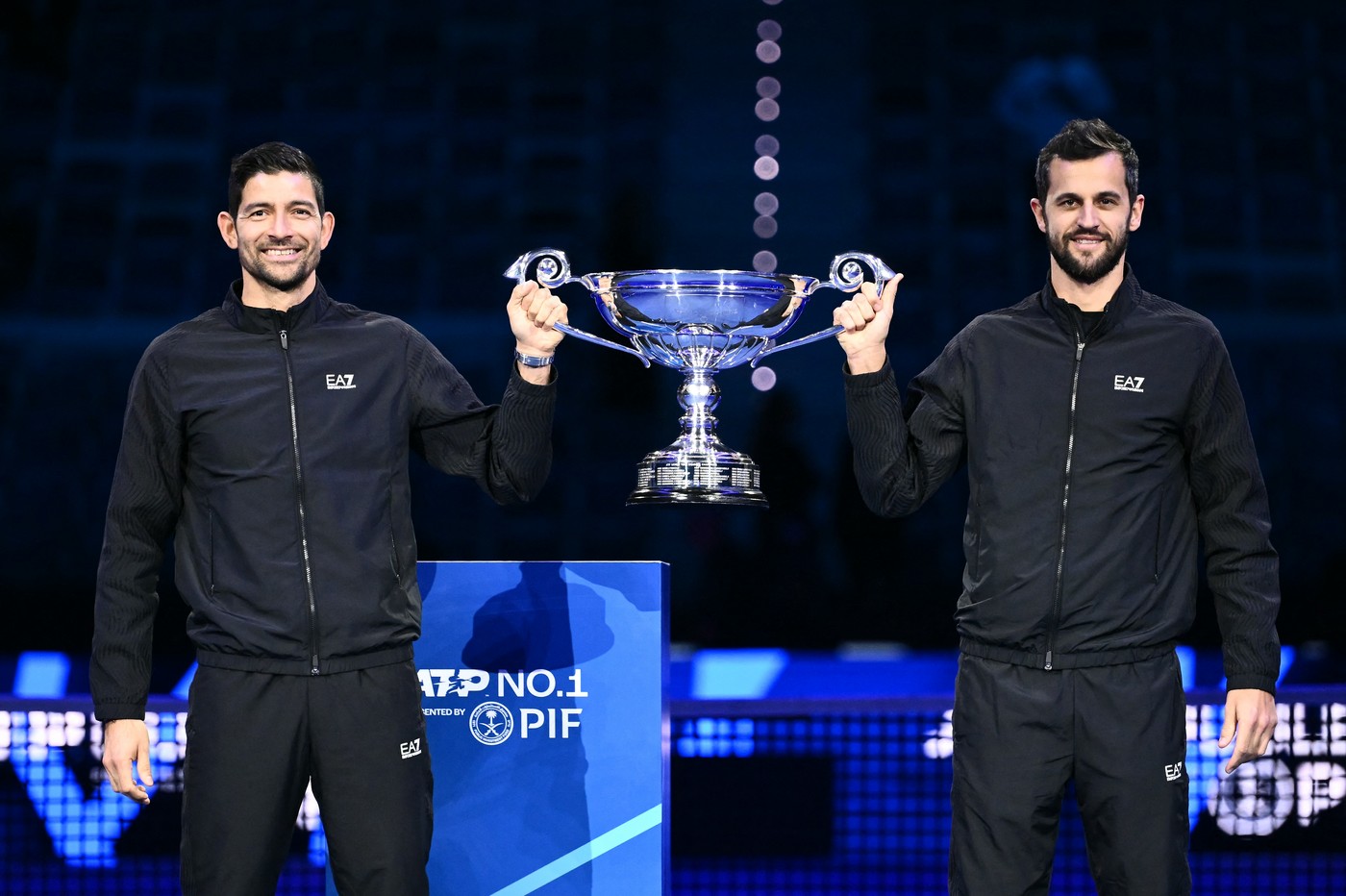 Salvador's Marcelo Arevalo (L) and teammate Croatia's Mate Pavic pose with the ATP year-end No.1 ranked doubles players trophy during the ATP Finals tennis tournament in Turin on November 15, 2024.,Image: 934759954, License: Rights-managed, Restrictions: , Model Release: no, Credit line: Marco BERTORELLO / AFP / Profimedia