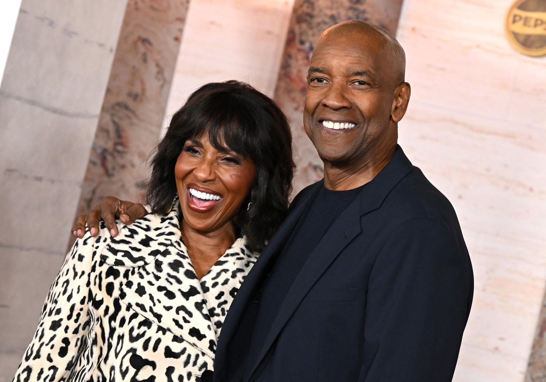 US actor Denzel Washington (R) and wife US actress Pauletta Washington attend the Los Angeles premiere of "Gladiator II" at the TCL Chinese Theatre in Hollywood, California, November  18, 2024.,Image: 936186433, License: Rights-managed, Restrictions: , Model Release: no, Credit line: LISA O'CONNOR / AFP / Profimedia