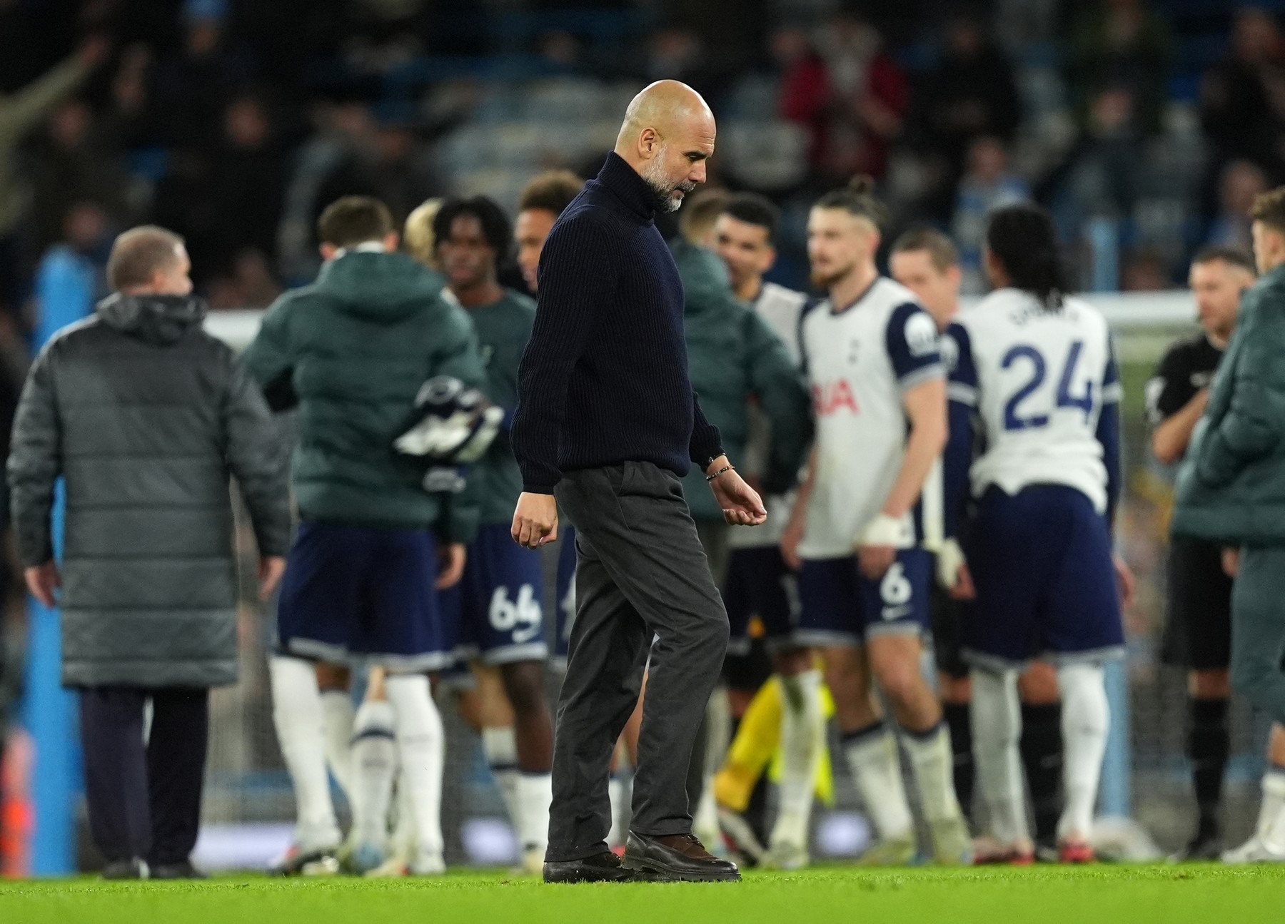 Manchester City manager Pep Guardiola appears dejected after the Premier League match at the Etihad Stadium, Manchester. Picture date: Saturday November 23, 2024.,Image: 937983718, License: Rights-managed, Restrictions: EDITORIAL USE ONLY No use with unauthorised audio, video, data, fixture lists, club/league logos or "live" services. Online in-match use limited to 120 images, no video emulation. No use in betting, games or single club/league/player publications., Model Release: no, Credit line: Martin Rickett / PA Images / Profimedia