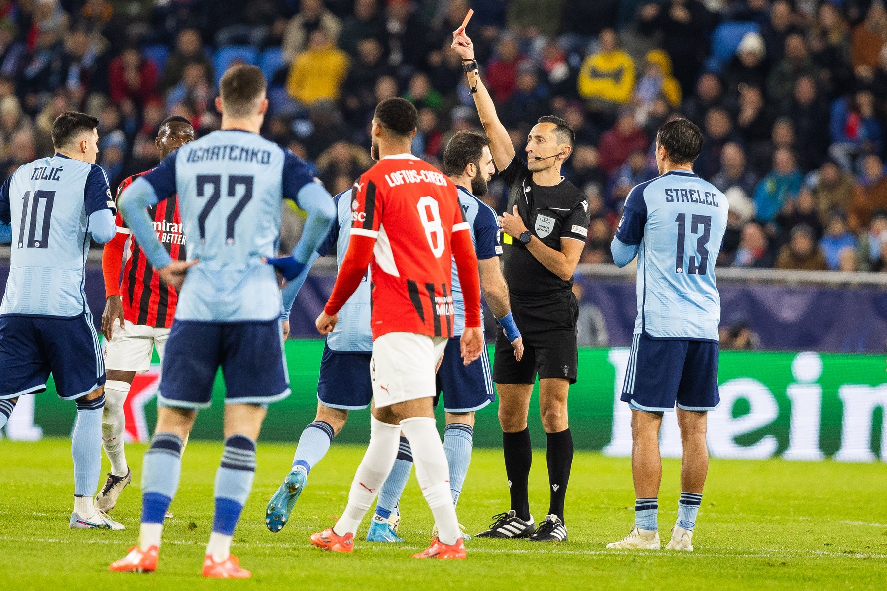 Referee Jose Maria Sanchez Martinez shows a red card to Slovan Bratislava's Croatian midfielder #10 Marko Tolic (L) during during the UEFA Champions League football match SK Slovan Bratislava vs AC Milan in Bratislava, Slovakia on November 26, 2024.,Image: 939513386, License: Rights-managed, Restrictions: , Model Release: no, Credit line: -STR / AFP / Profimedia