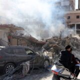 Residents ride a scooter amid destruction caused by Israeli bombing in the southern Lebanese city of Tyre on November 28, 2024, a day after a cease fire between Israel and Hezbollah took hold.  Since the ceasefire took effect on November 27, tens of thousands of Lebanese who fled their homes headed back to their towns and villages, only to find scenes of devastation.,Image: 940413177, License: Rights-managed, Restrictions: , Model Release: no, Credit line: Anwar AMRO / AFP / Profimedia